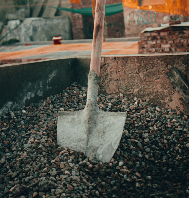 Shovel in recycled gravel unit.